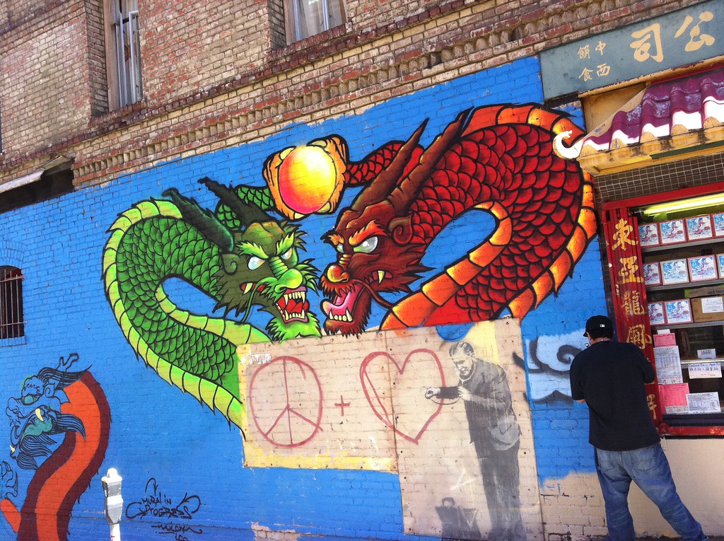 Twick creating a mural around the Chinatown Banksy Flickr