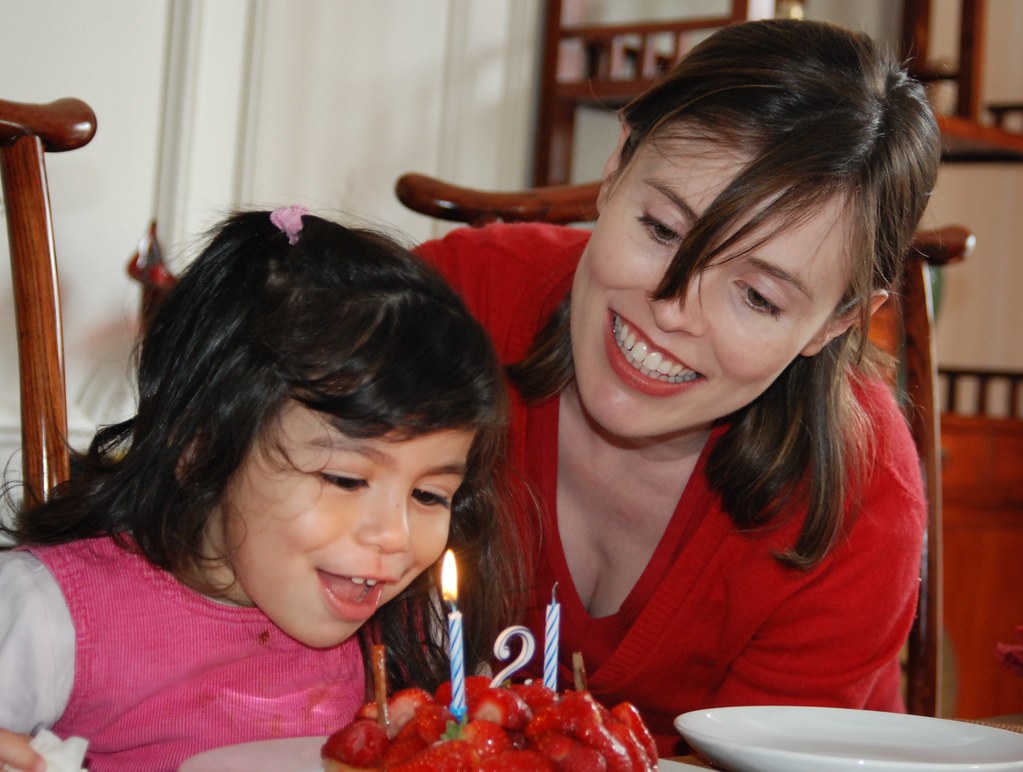 Evelyn blowing out her candles, 1st May Hery & Caroline Flickr