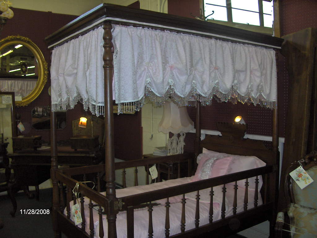 Antique toddler bed Underneath the canopy were swirls of p… Flickr