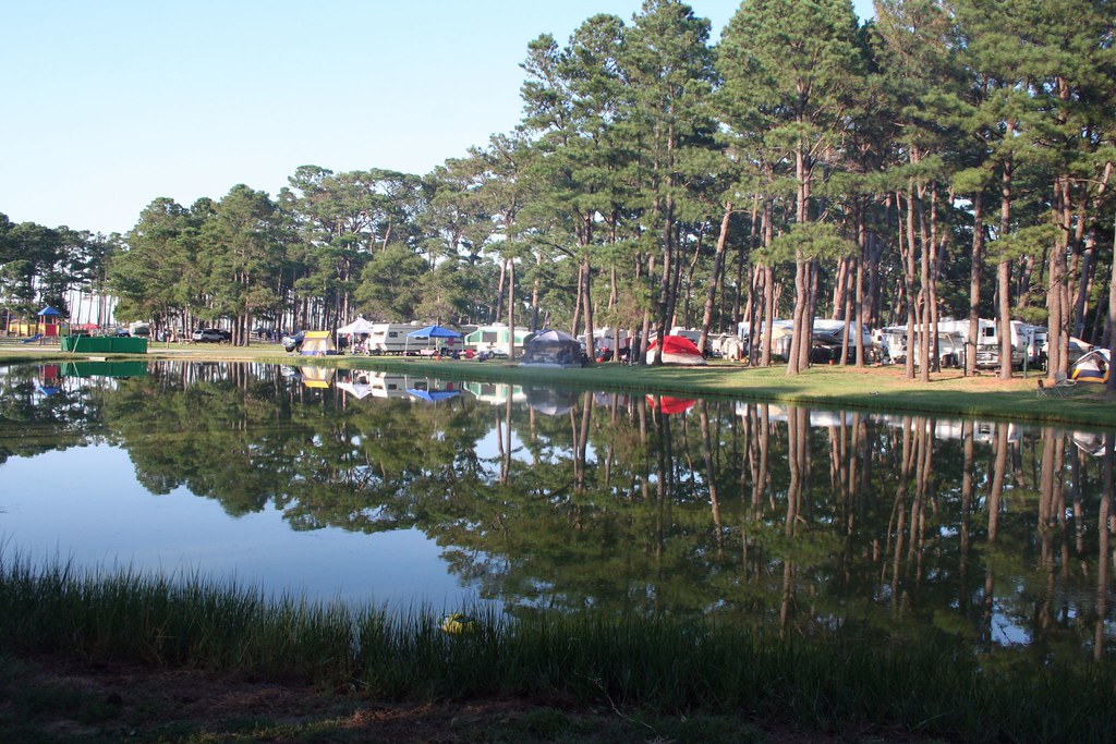Reflections of tents on the pond taken at Cherrystone Camp… Flickr