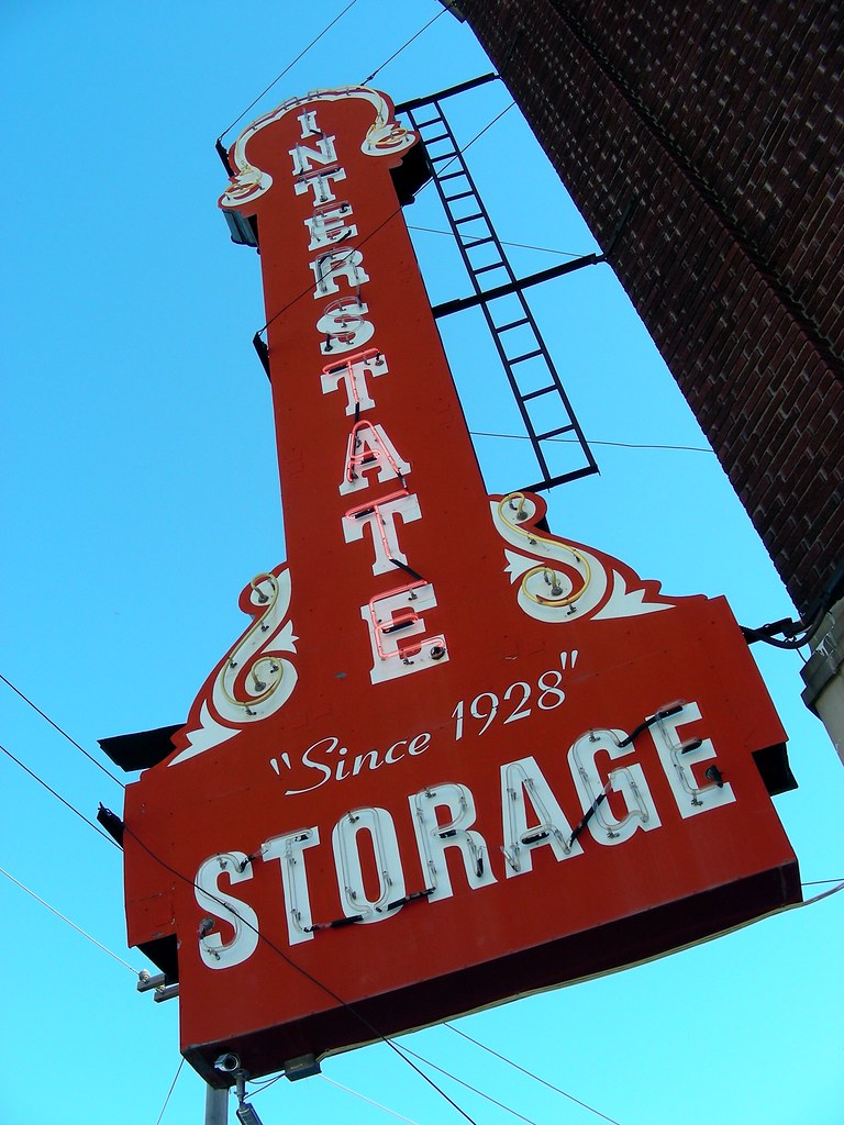 Interstate Storage Since 1928 Look at the ladder on the ri… Flickr