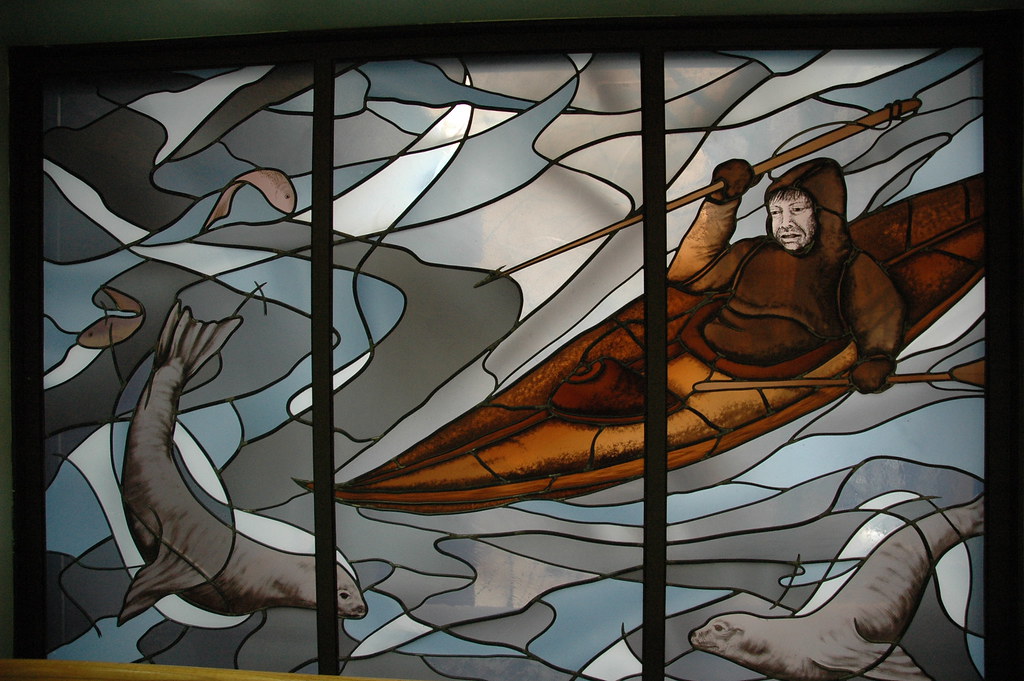 Eskimo man, with harpoon, water and ice, stained glass window, Alaska