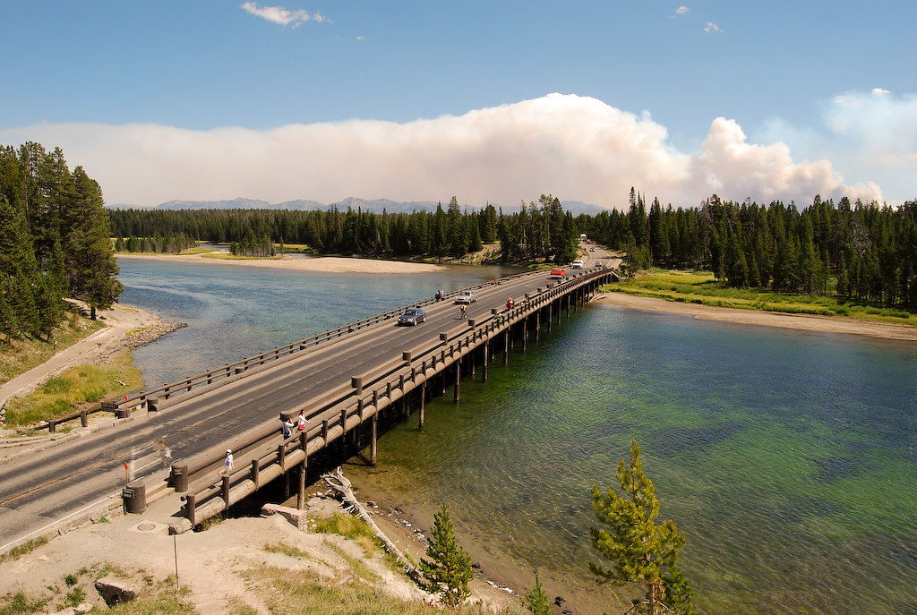 Fishing Bridge at Yellowstone National Park with Forest Fi… Flickr