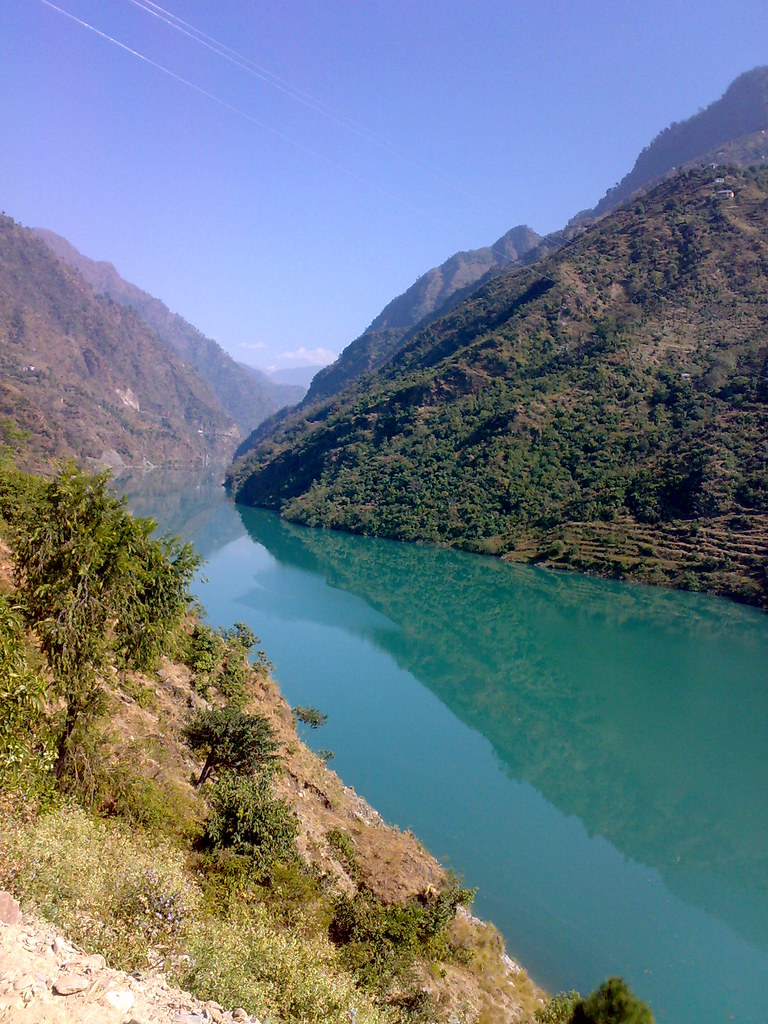 Beas river The river is still, but there is the presence o… Flickr