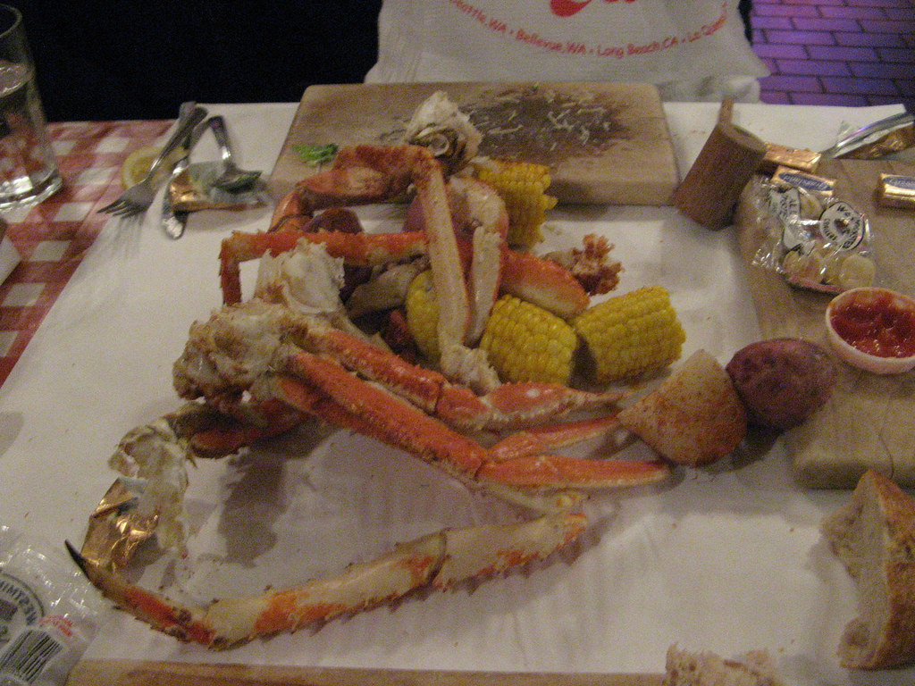 Seattle Crab Pot King Crab legs and veggies! Thomas Sidders Flickr