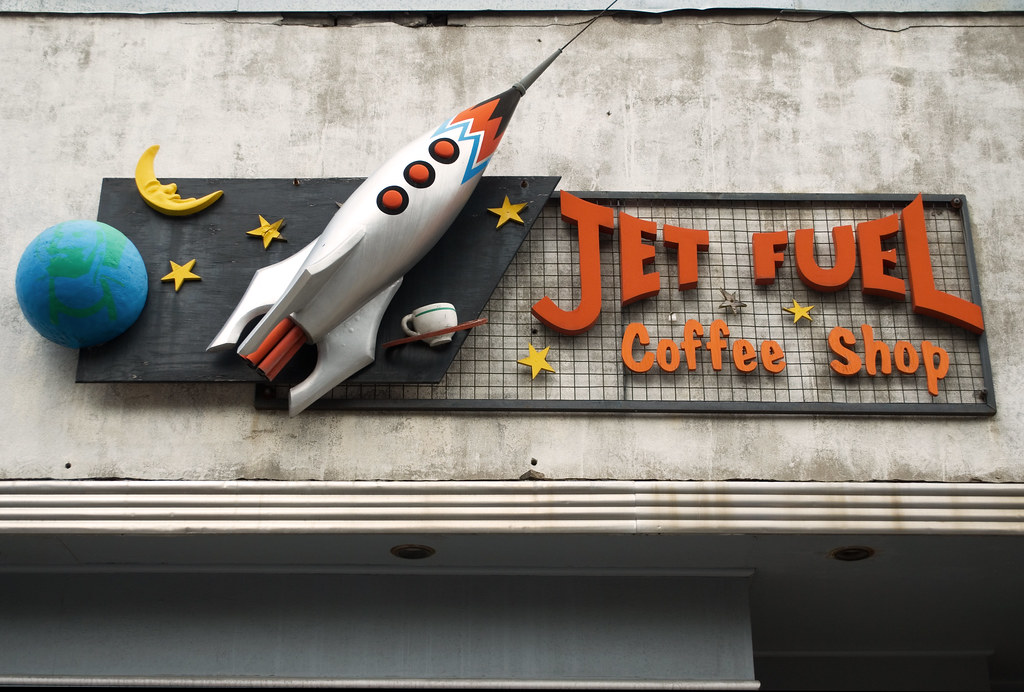 Jet Fuel Coffee Shop I love this sign. Not sure what the c… Scott