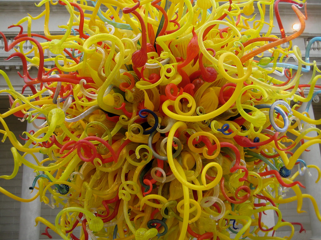 Dale Chihuly "The Sun" Close shot of an outdoor display of… Flickr
