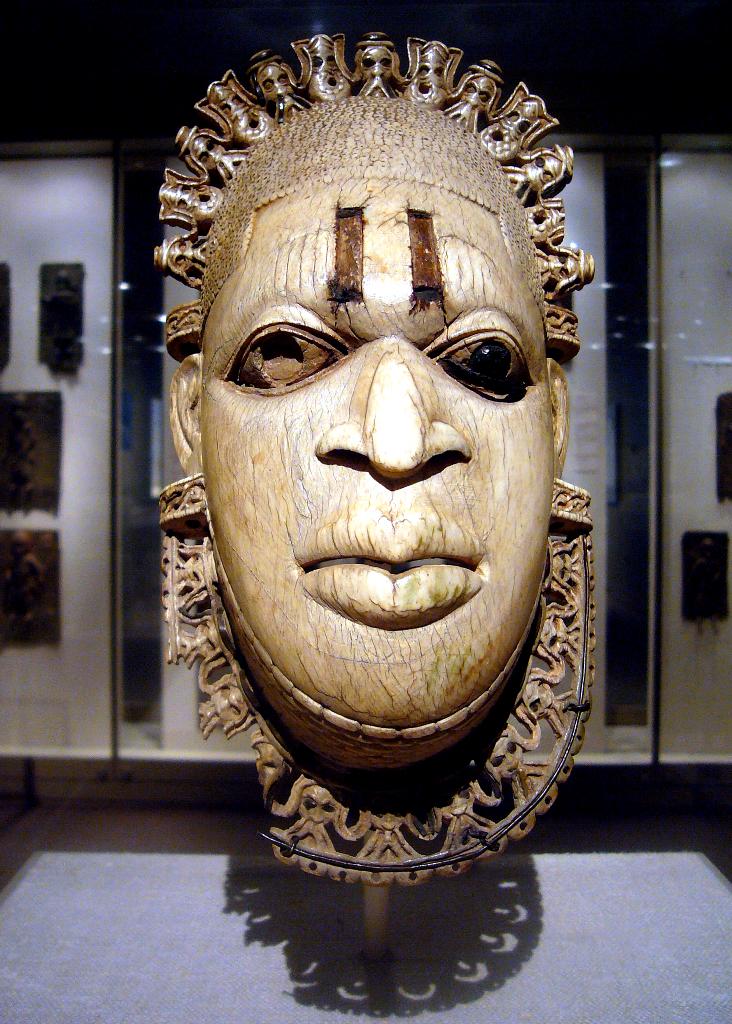Pendant Mask Iyoba (Queen Mother) Ivory, iron, copper Nig… Flickr