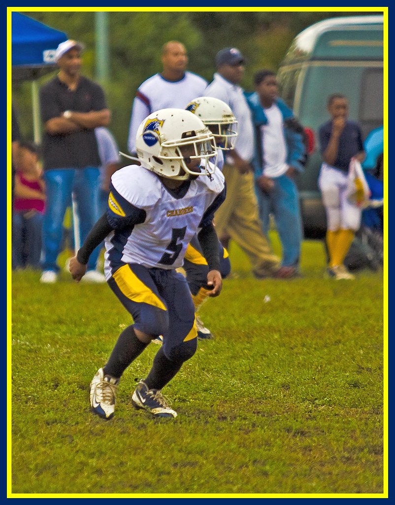 Pop Warner Football PG Chargers 105lb limit football team.… Michael