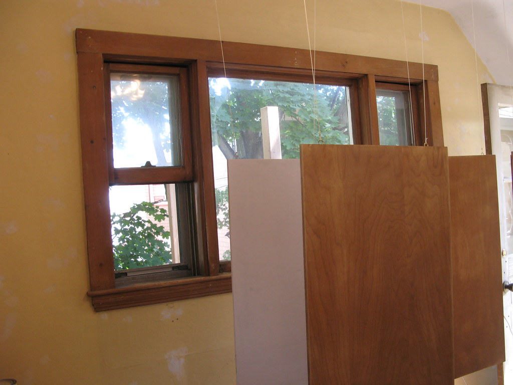 one door painted. hanging system proves a challeng… Flickr