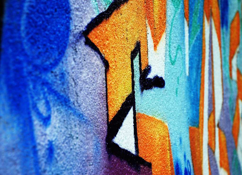 Spray Painted Wall A wall covered in spray painted graffit… Flickr