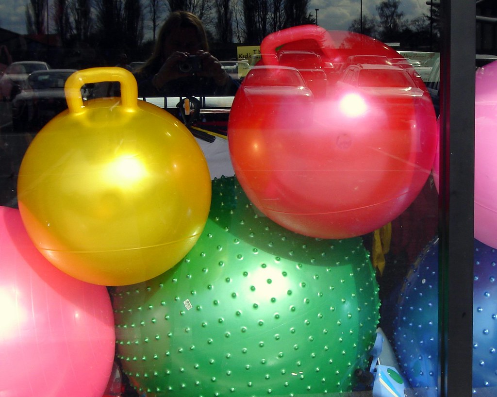 large bouncy balls with photographers reflection Sarah Macmillan Flickr