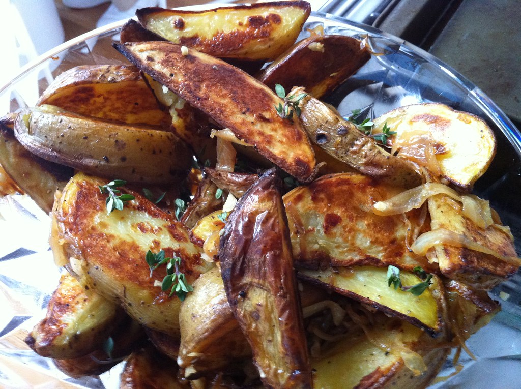 Roasted potatoes with garlic and caramelized onions Flickr