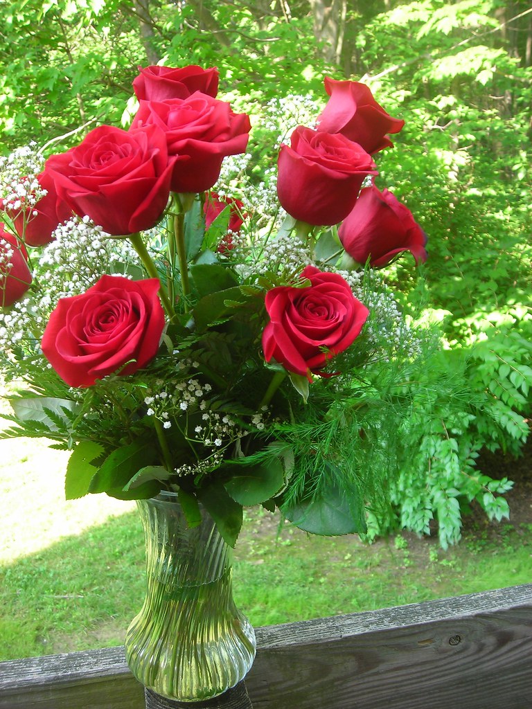 Roses When you get a dozen roses delivered to work, I will… Flickr