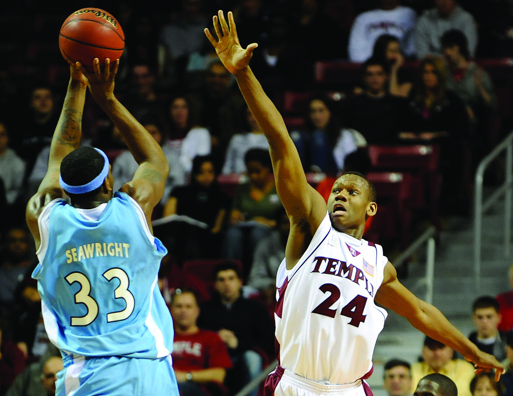 tu_v_RI basketball John Birk 3 Rhode Island's Kahiem Seawr… Flickr