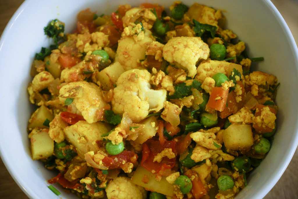 Ultimate tofu scramble Potatoes, peas, cauliflower, tomato… Flickr