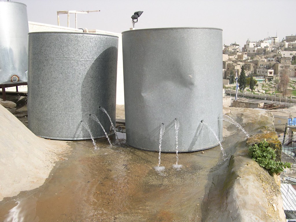 Palestinian water tanks destroyed by settlers in Hebron Flickr