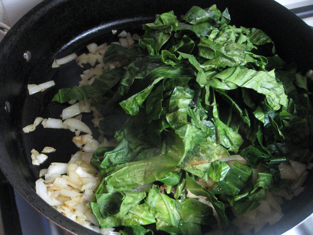 IMG_6328 Adding microwavewilted collard greens to pan wit… Flickr