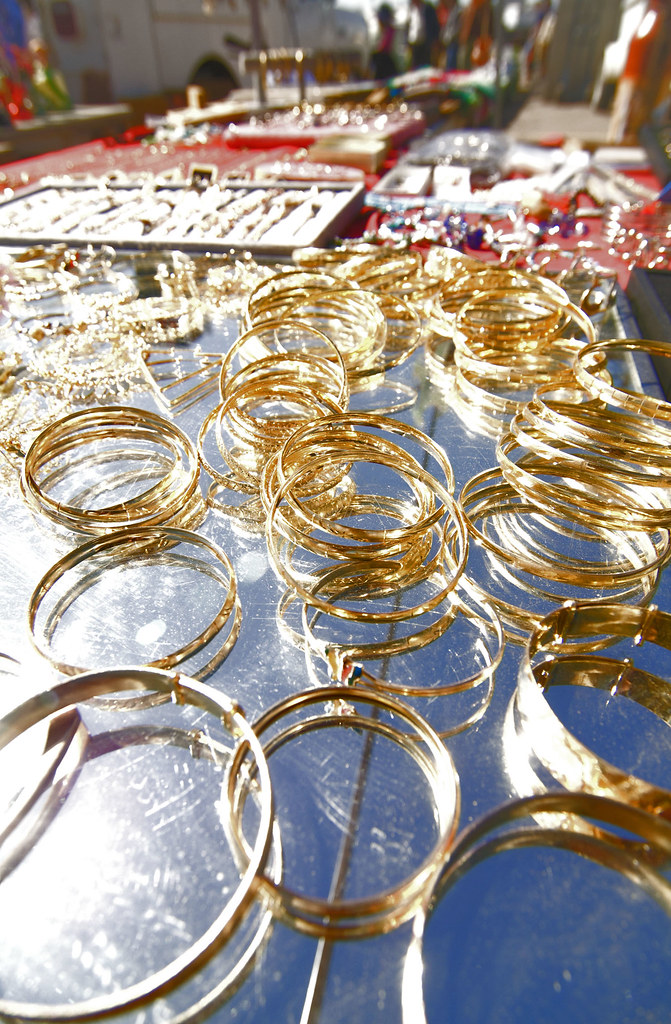Gold Rings Flea Market jewelry vendor. This photo was horr… Flickr