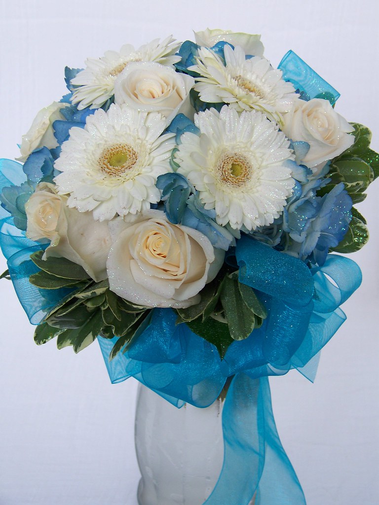 Prom Bouquet A clutch style Prom Bouquet with ivory roses,… Flickr