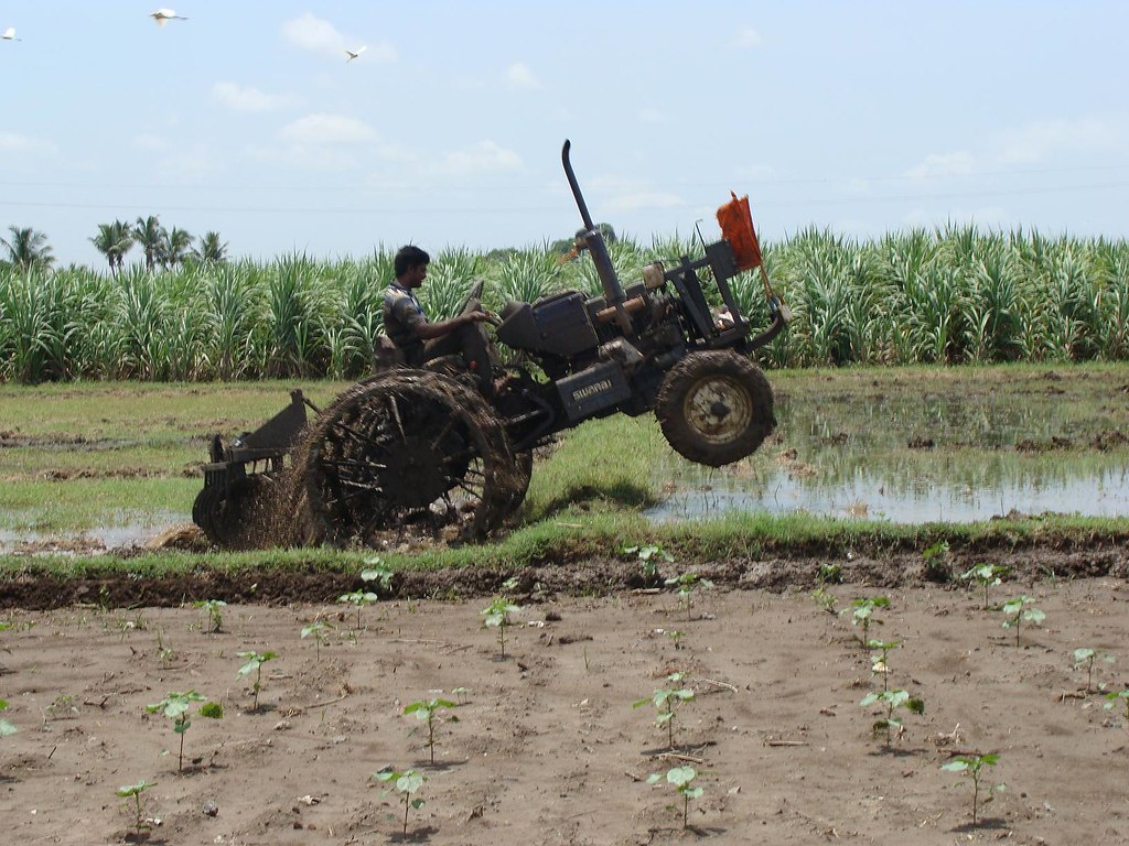tractor tractor driver giving his own performance in field… Flickr