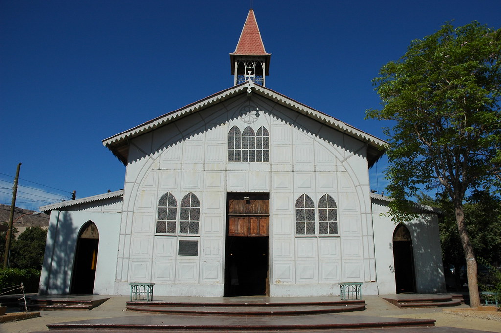 Sunny front entrance, 120 yr old prefab Iglesia Santa Barbara de
