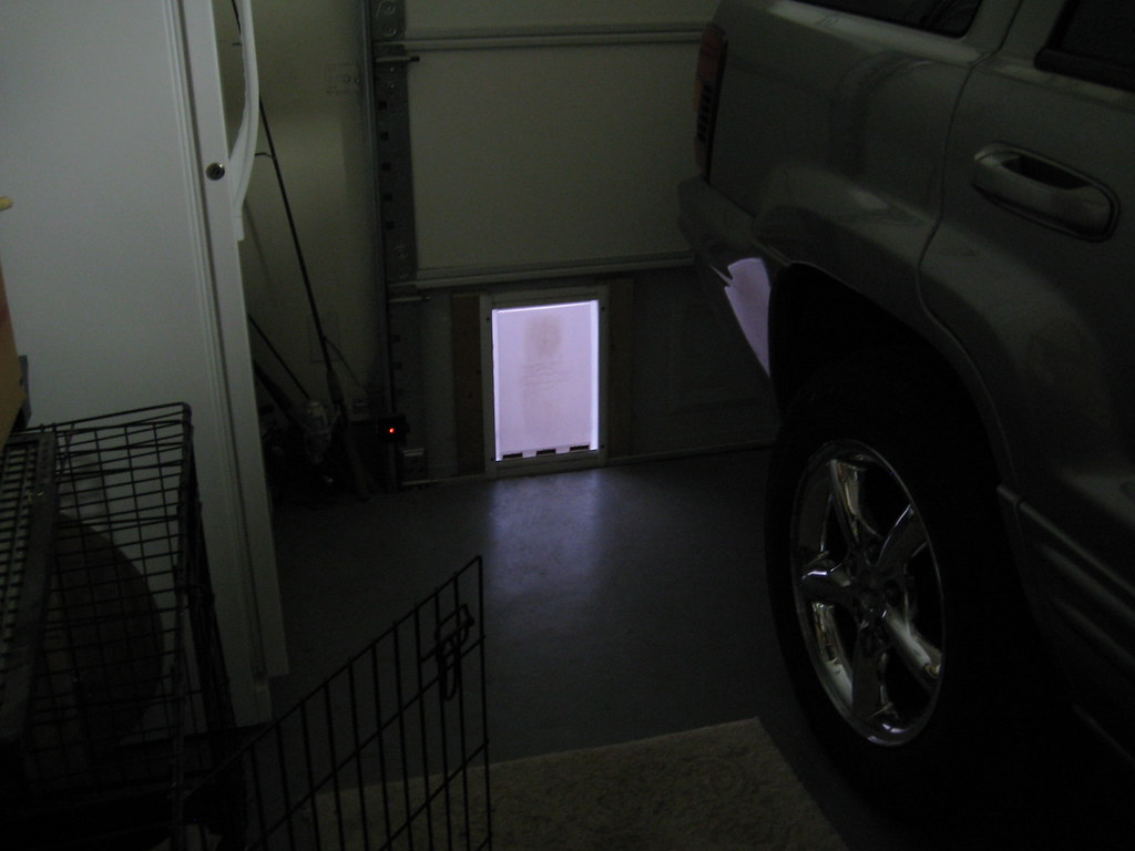 Garage door doggie door Jason West Flickr