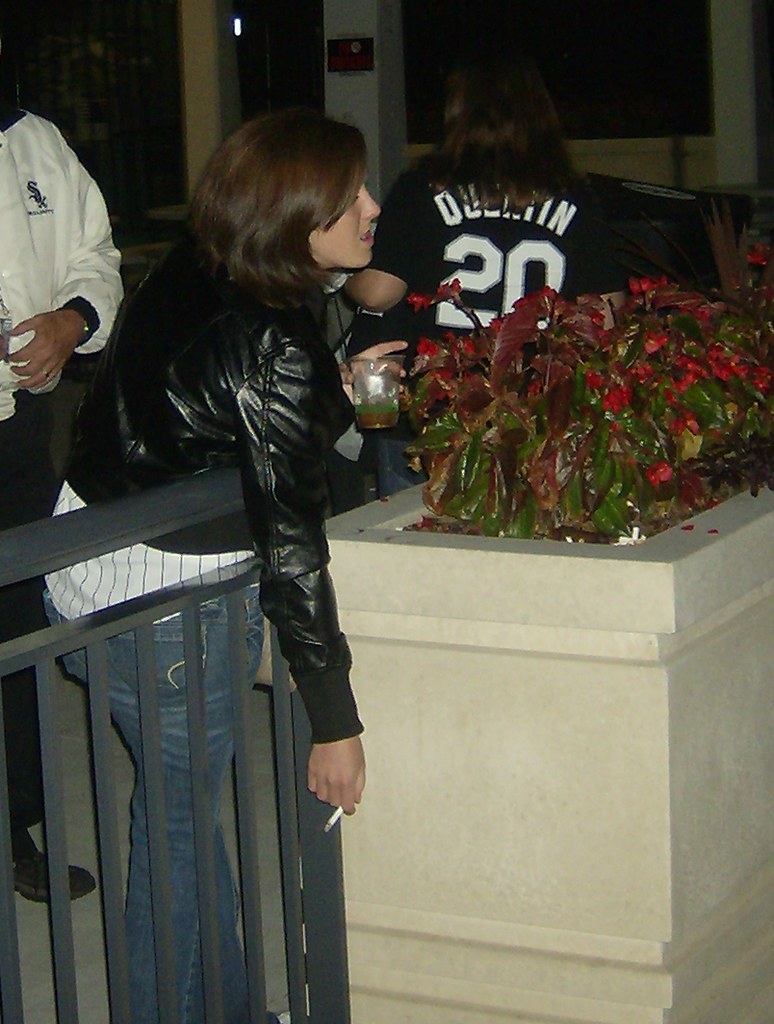 Woman Smoking cigarette at baseball game This woman is smo… Flickr
