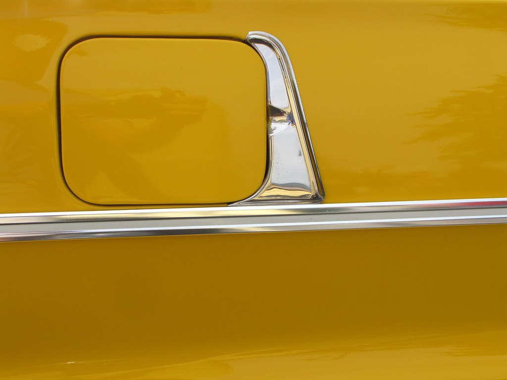 Chrome Trim Chrome trim around a fuel filler door. The car… Flickr