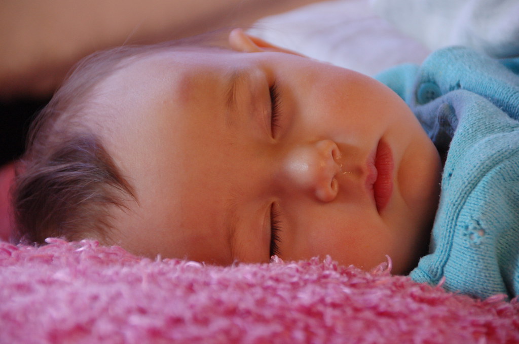 Sleeping with twin bumps on her head more mobility means m… Flickr