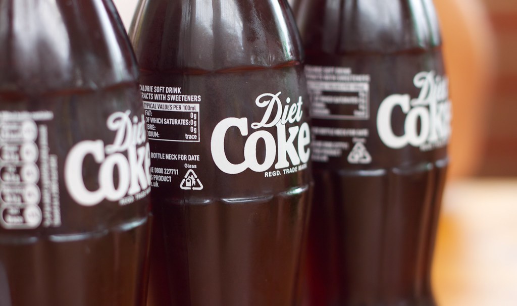 3 full glass diet coke bottles Jonathan Oakley Flickr