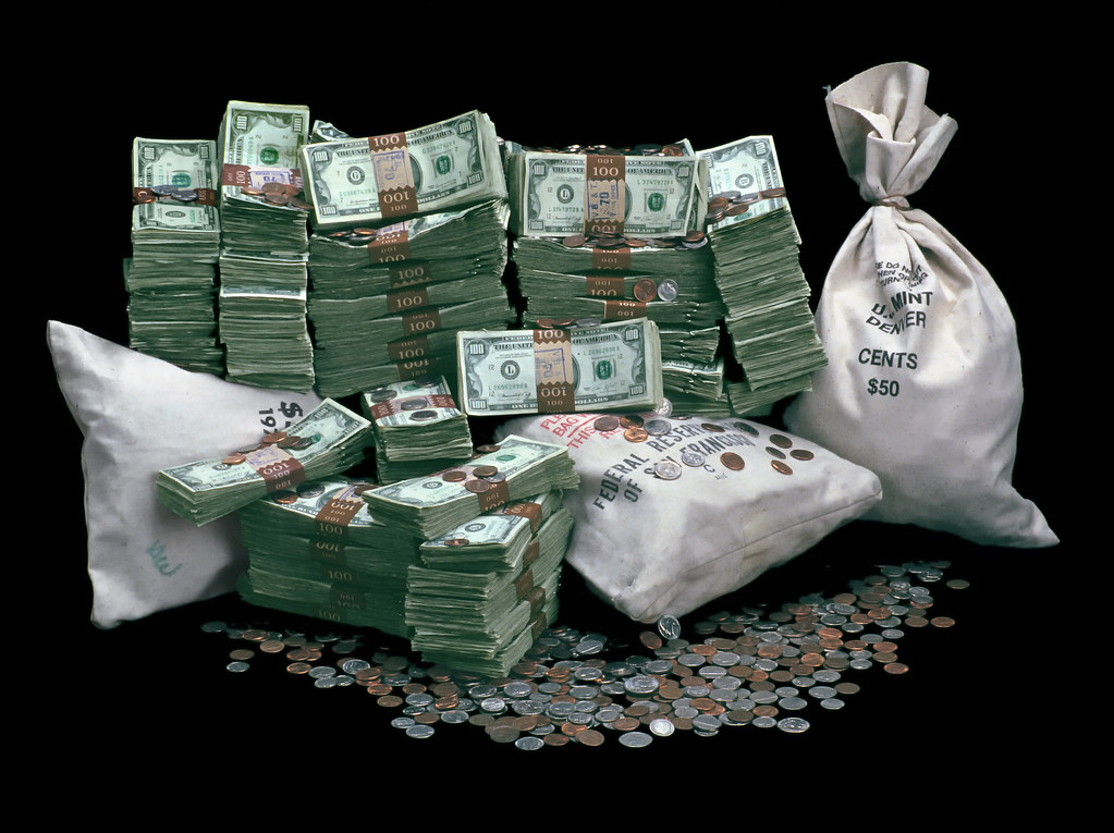 Piles of Money Yes, this is REAL money. Piles and stacks o… Flickr
