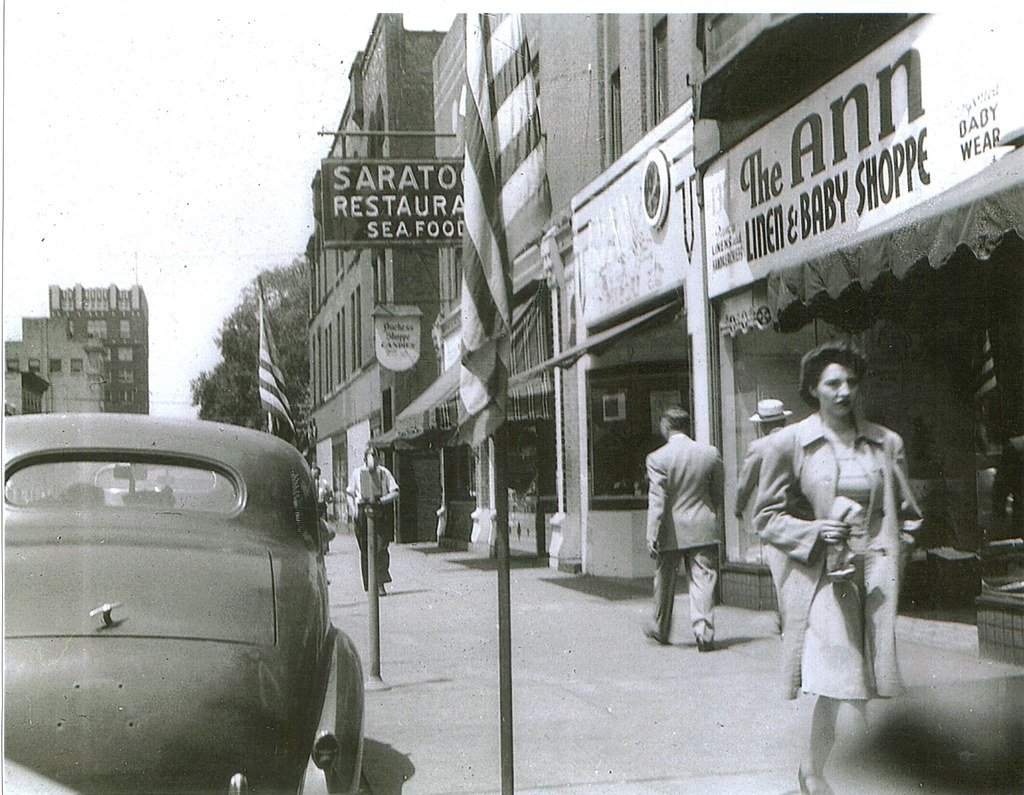 Sidewalk scene, East Market St., Warren, Ohio, circa 1950's a photo