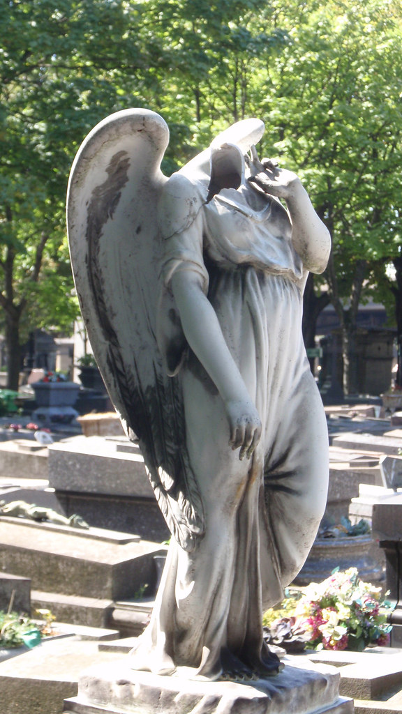 Headless angel statue Monceau Flickr