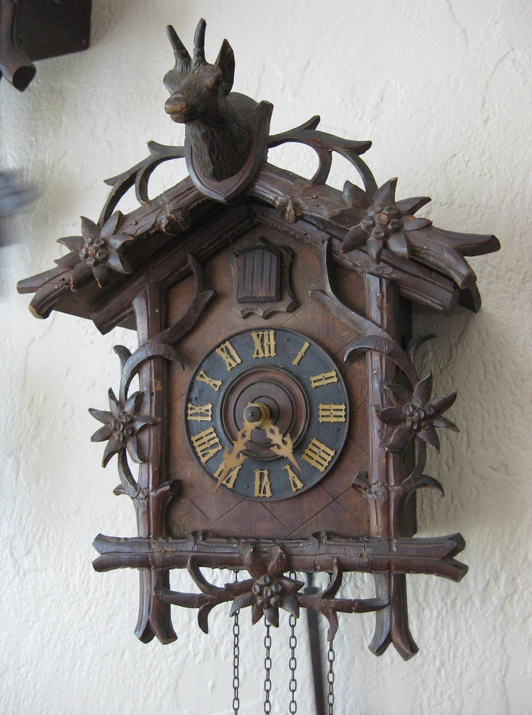 Cuckoo clock with edelweiss carvings John C. Flickr