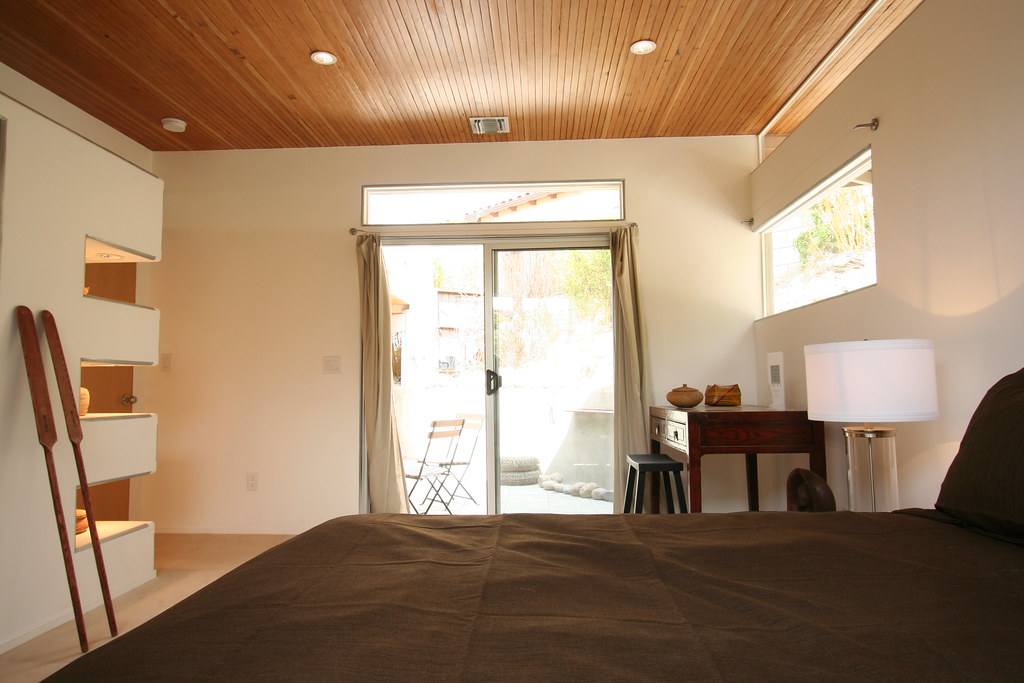 Bedroom Recycled douglas fir ceiling glows with light from… Flickr