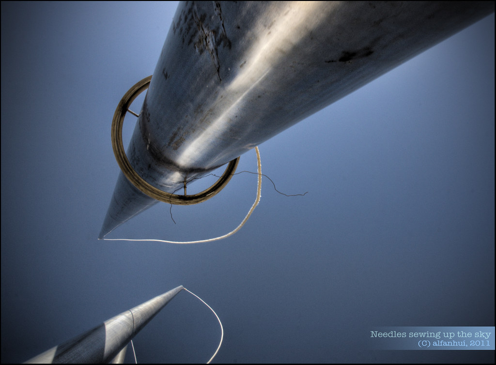 Giant needles Giant needles sewing up the sky (the rain ha… Flickr