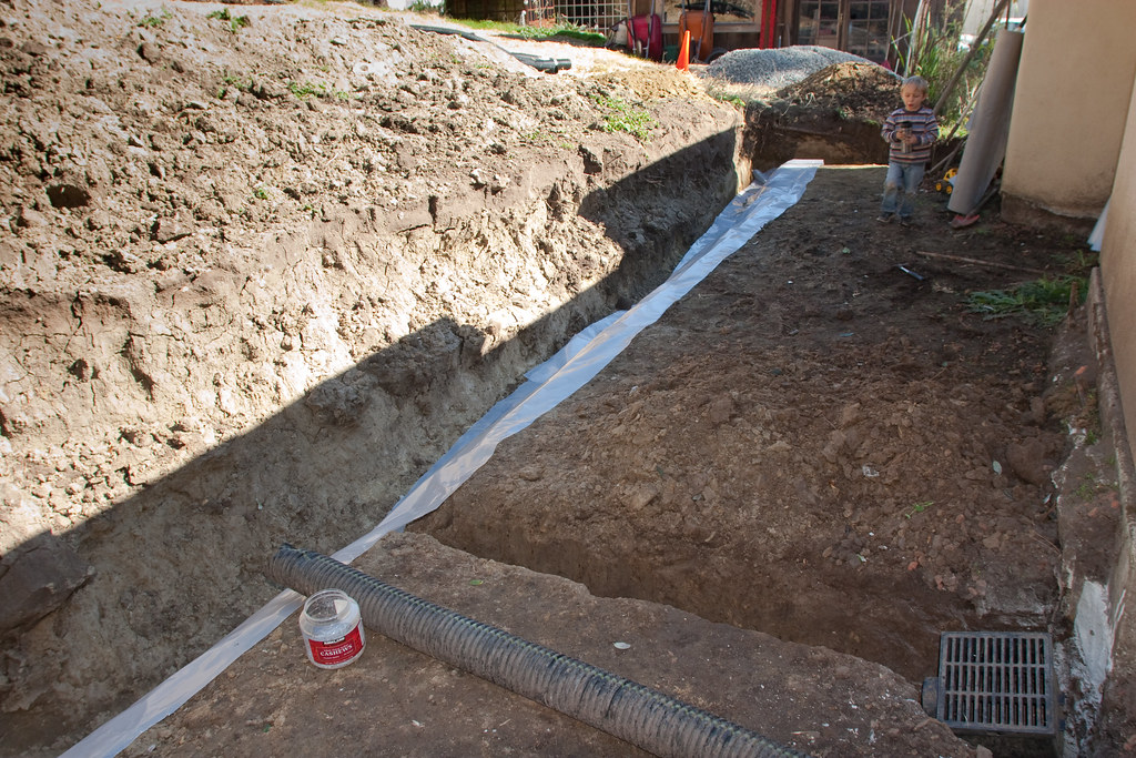 Putting in Uphill Drainage Putting in a french drain uphil… Flickr