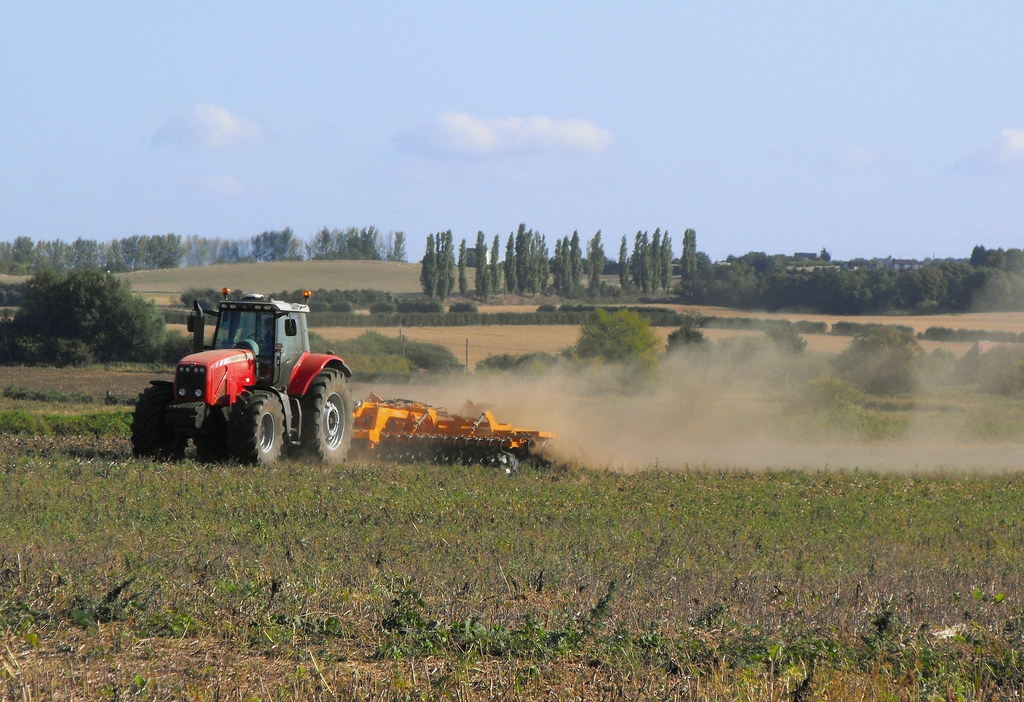 Tractor Cultivating Turning the soil over, leaving a trail??? Flickr