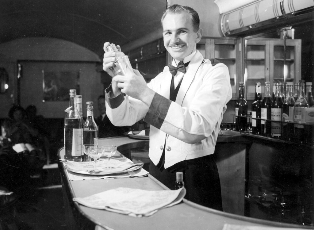 Blue Train Lounge Bar, Steward Mixing Cocktails [ID50449]… HiltonT Flickr
