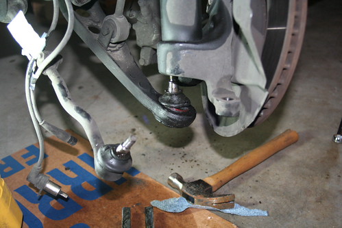 Pry out the tie rod and the control arm ball joints from t… | Flickr