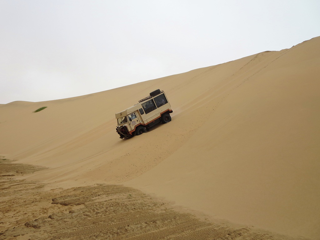 Offroad Vehicle An offroad vehicle navigates a steep slo… Flickr