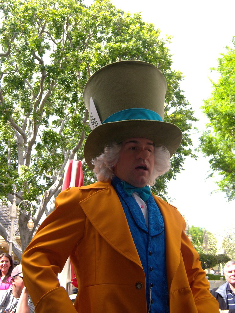 The Mad Hatter tells jokes to people at the Corner Cafe on… Flickr