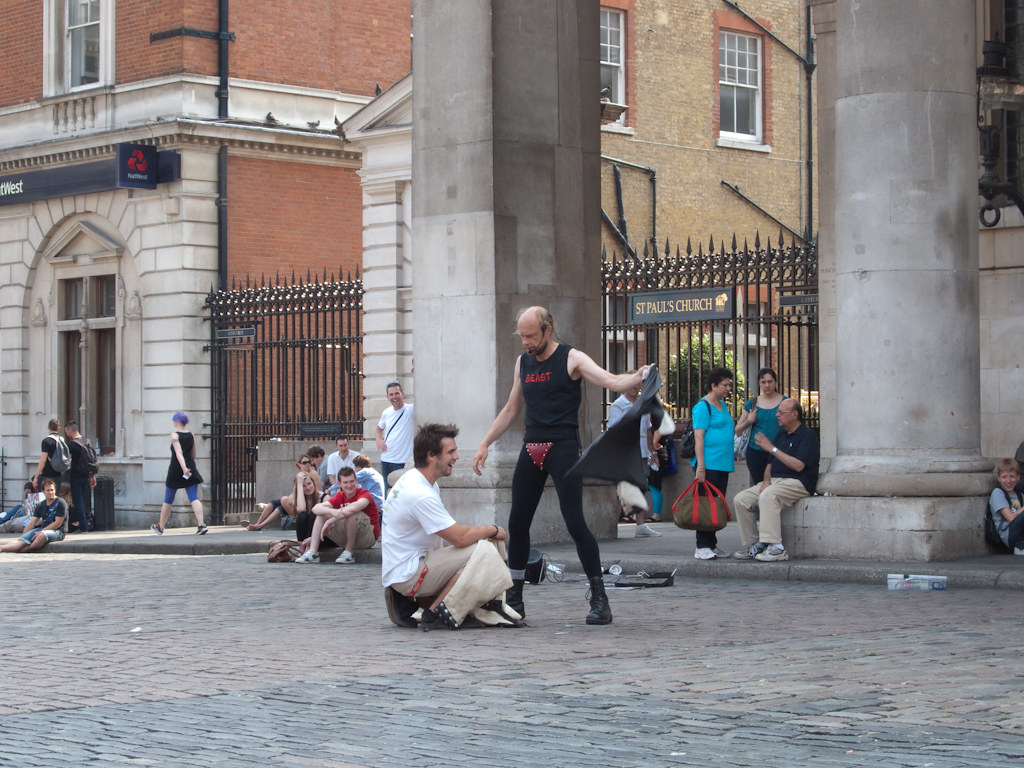 Escape artist A street performer reveals the costume used … Flickr