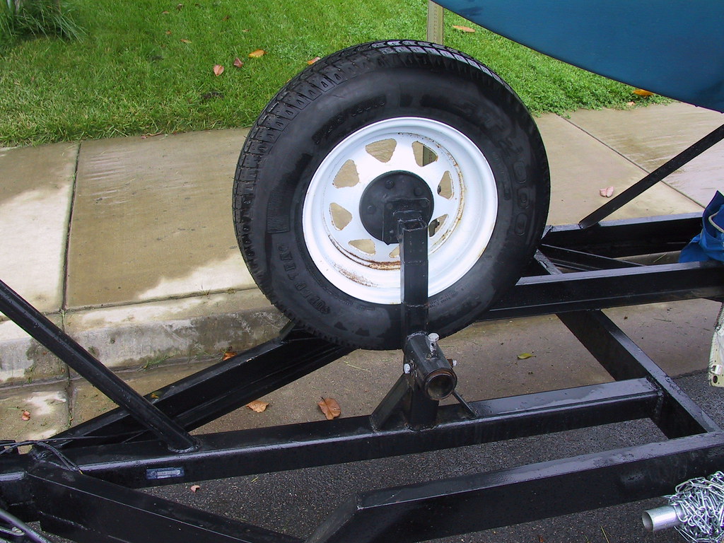 GE Spare Tire Axle Loosen a few bolts and this wheel flops… Flickr