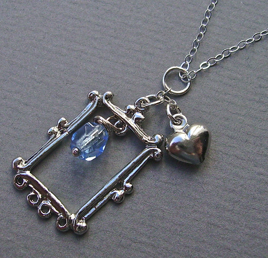 Pretty as a picture necklace This cute charm necklace feat… Flickr