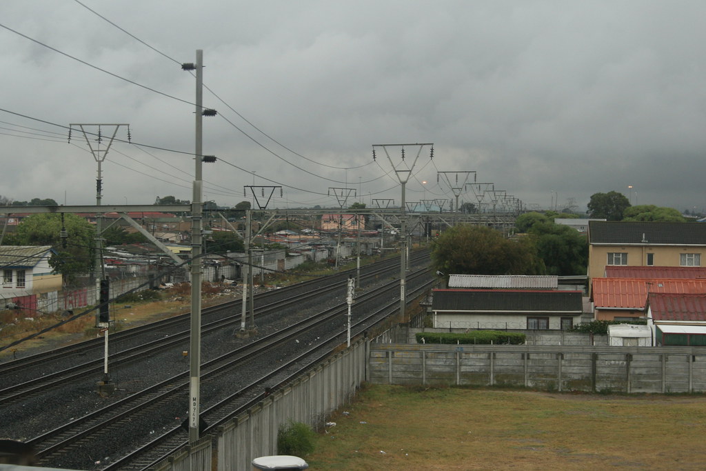 Railway through Cape Flats from N2 Gus_3815 Angus Willson Flickr