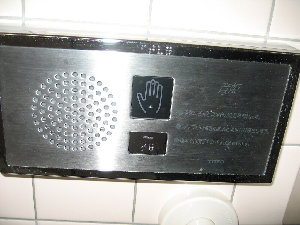 modesty noisemaker in bathroom stall erin Flickr