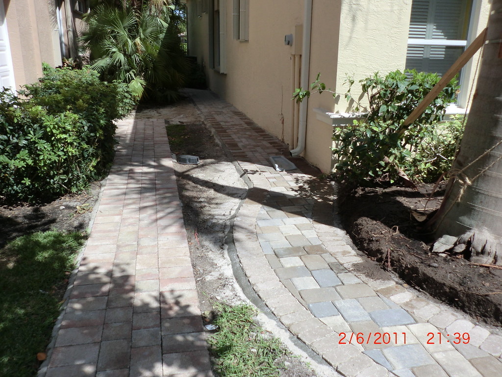 Walkway Walkway leading to Kaplan's side of home. Quality Cuts