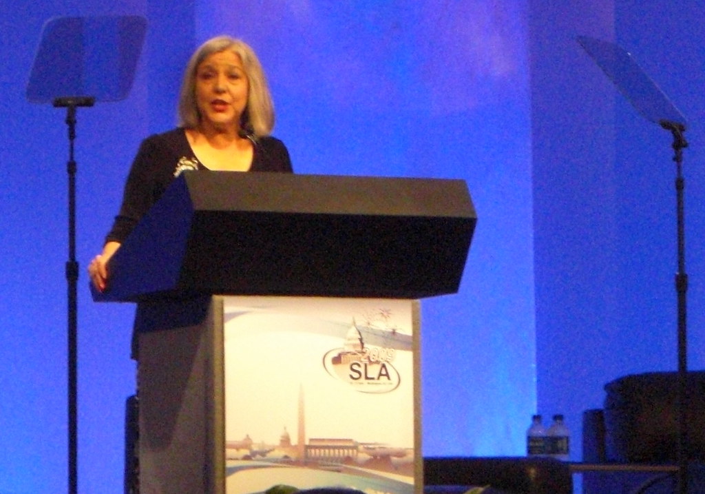 Gloria Zamora giving her presidential year review Richard H in WeHo Flickr